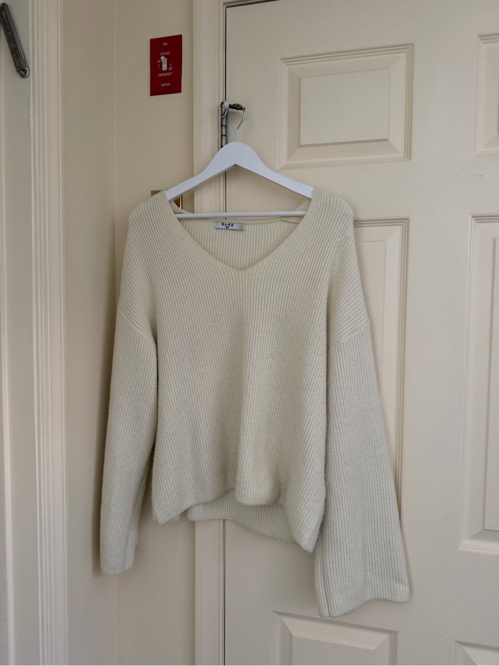 Cozy Oversized Ribbed V-Neck Sweater in Cream